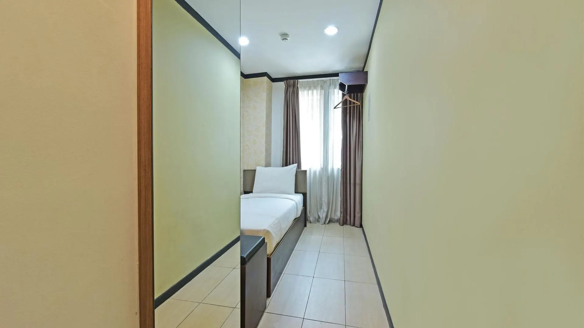 Oyo 91009 One Enigma Hotel Куала-Лумпур